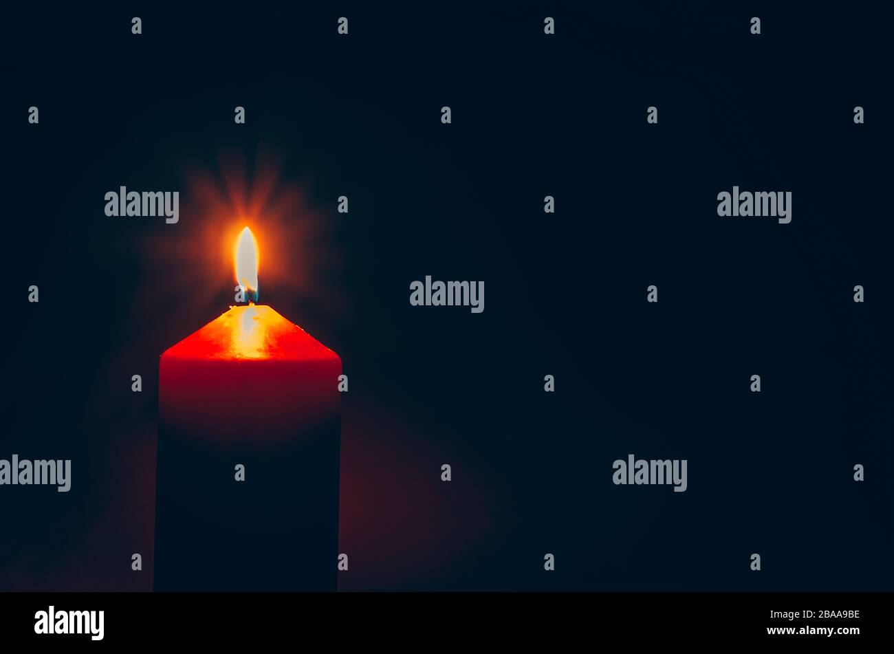 one red burning wax candle with black copy space background Stock Photo ...