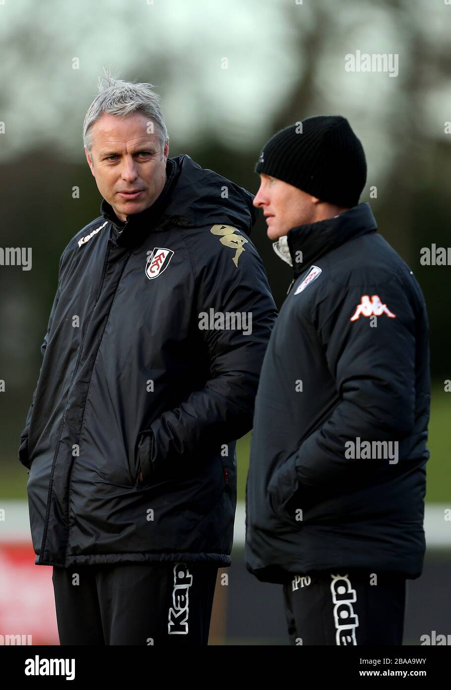 Fulham Academy coach Kit Symons (left) on the touchline Stock Photo