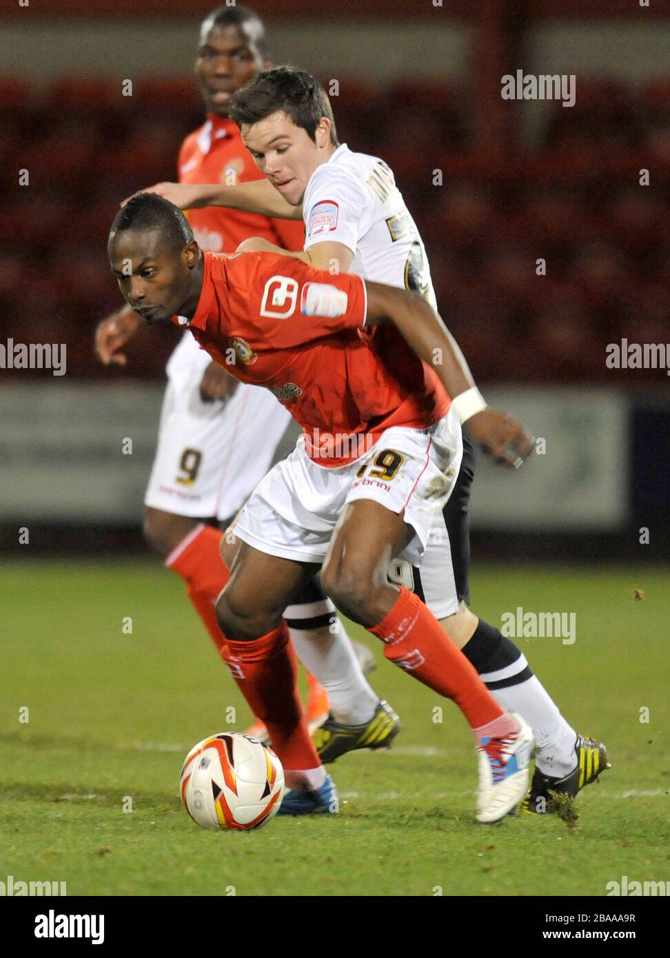 Crewe's Abdual Osman holds off Doncaster's Harry Middleton Stock Photo
