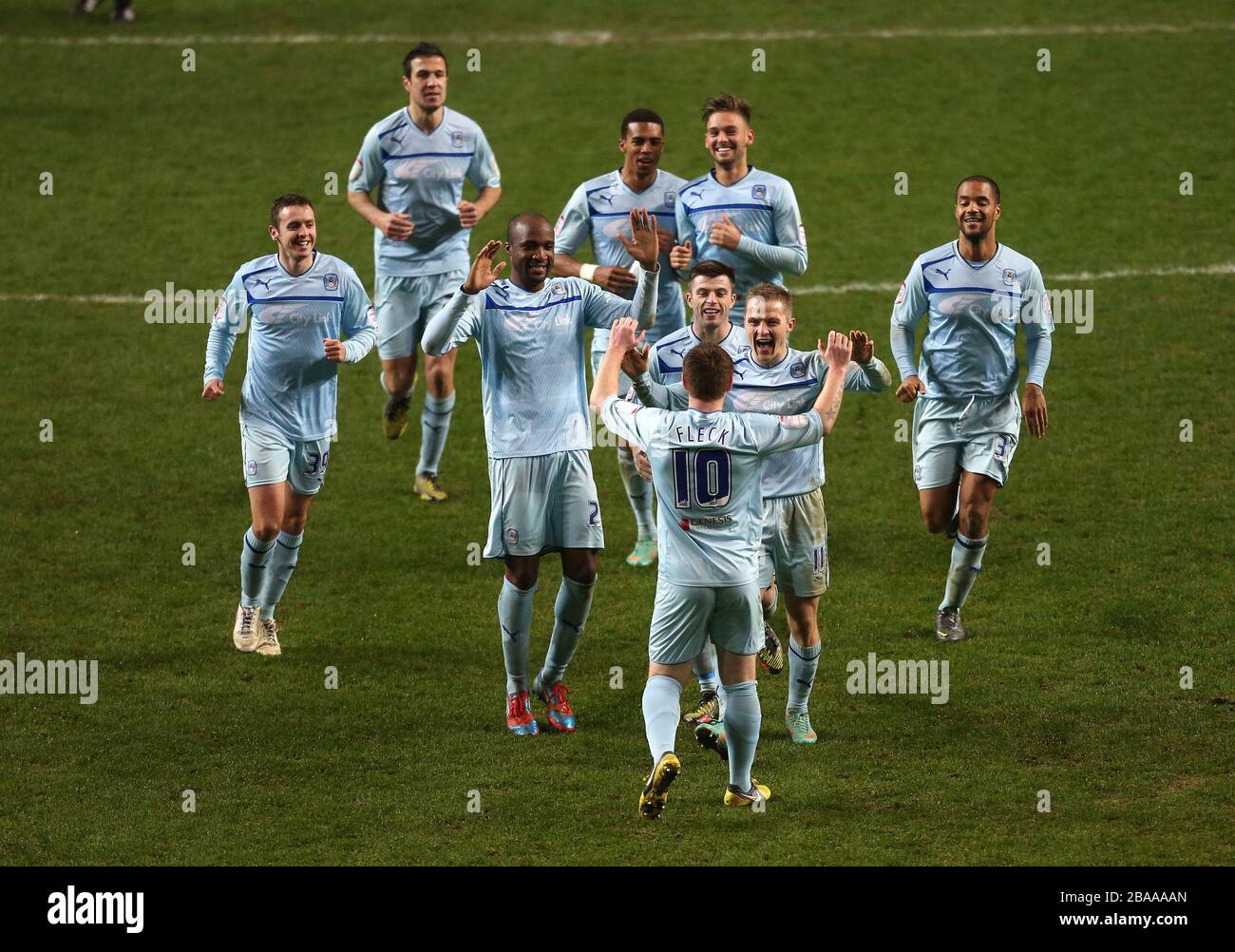 Coventry City's players run to congratulate Gary McSheffrey after he scored the winning penalty Stock Photo