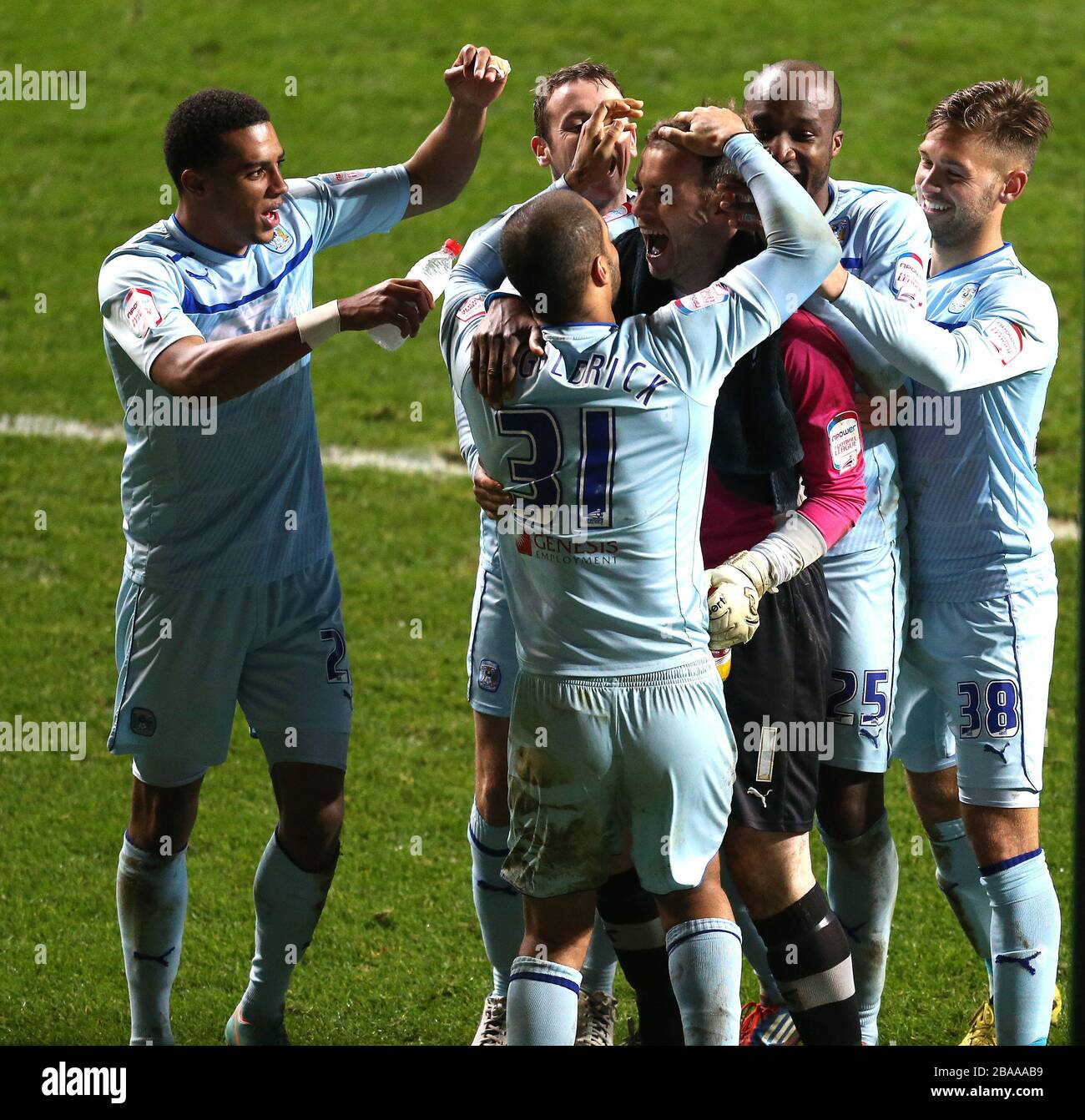 Coventry City's players congratulate keeper Joe Murphy after the penalty shoot out Stock Photo