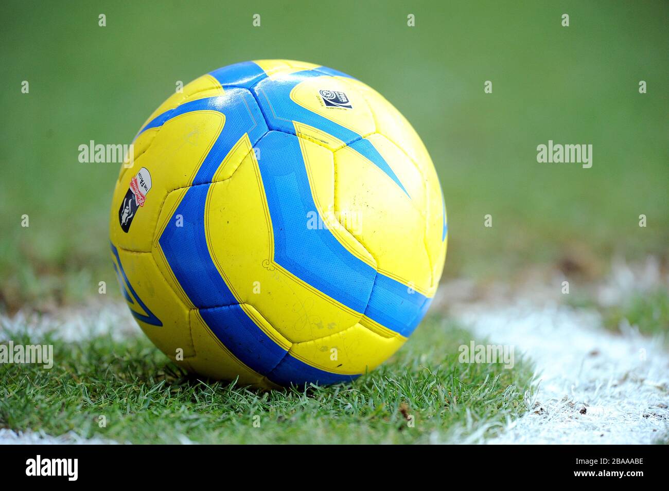 A match day ball on the pitch Stock Photo