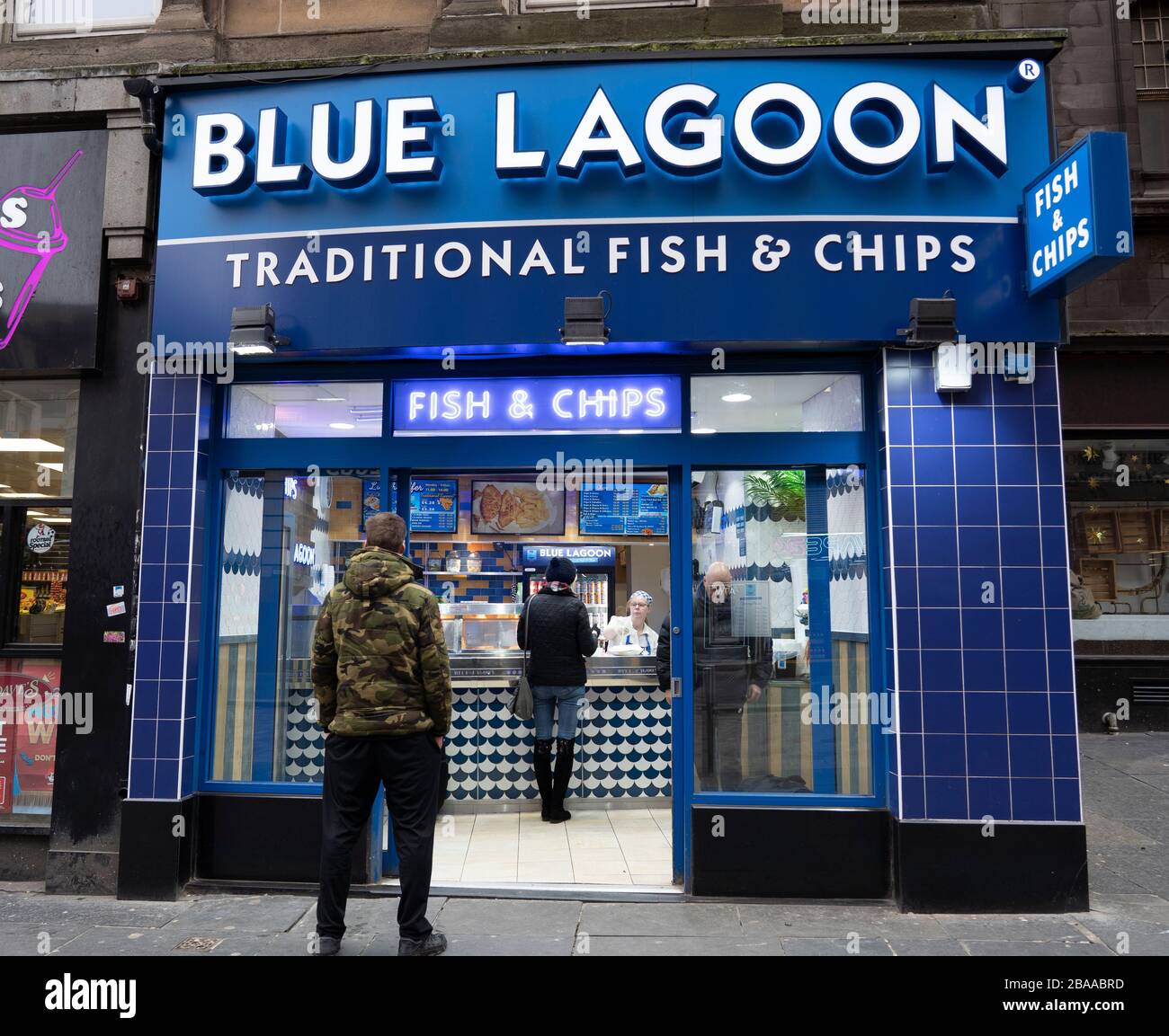 Glasgow, Scotland, UK. 26 March, 2020. Views from city centre in Glasgow on Thursday during the third day of the Government sanctioned Covid-19 lockdown. The city is largely deserted. Only food and convenience stores open. Pictured; Blue Lagoon fish and chip shop stayed open. Iain Masterton/Alamy Live News Stock Photo