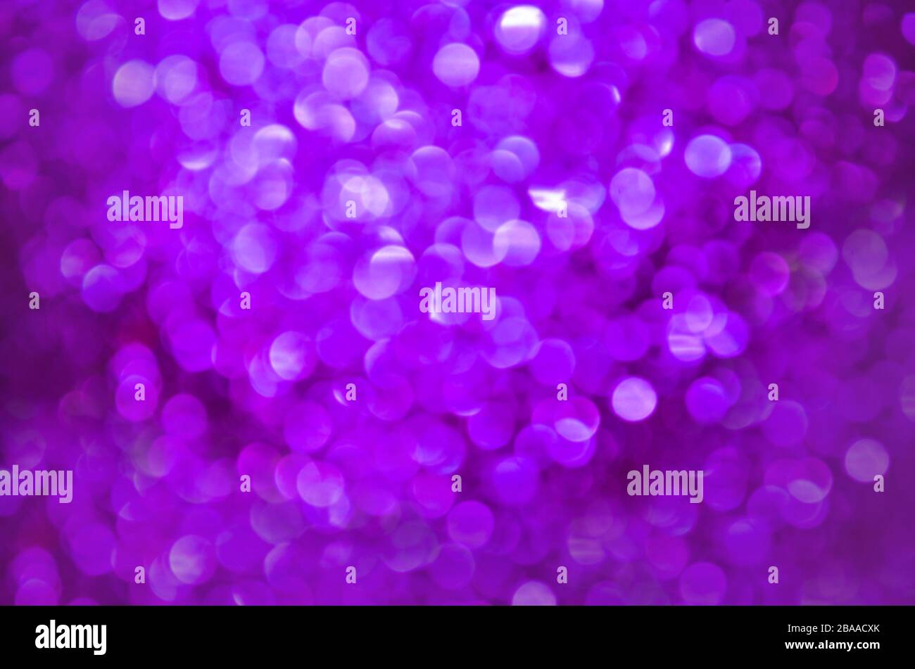 Violet bokeh background. Puple bokeh background. Purple bokeh defocused  backdrop Stock Photo - Alamy