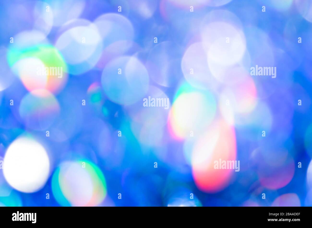 Winter seasonal bokeh background. Blue bokeh light backgrounds. Blue bubble  background. Abstract blurred reflection lighting on blue background Stock  Photo - Alamy