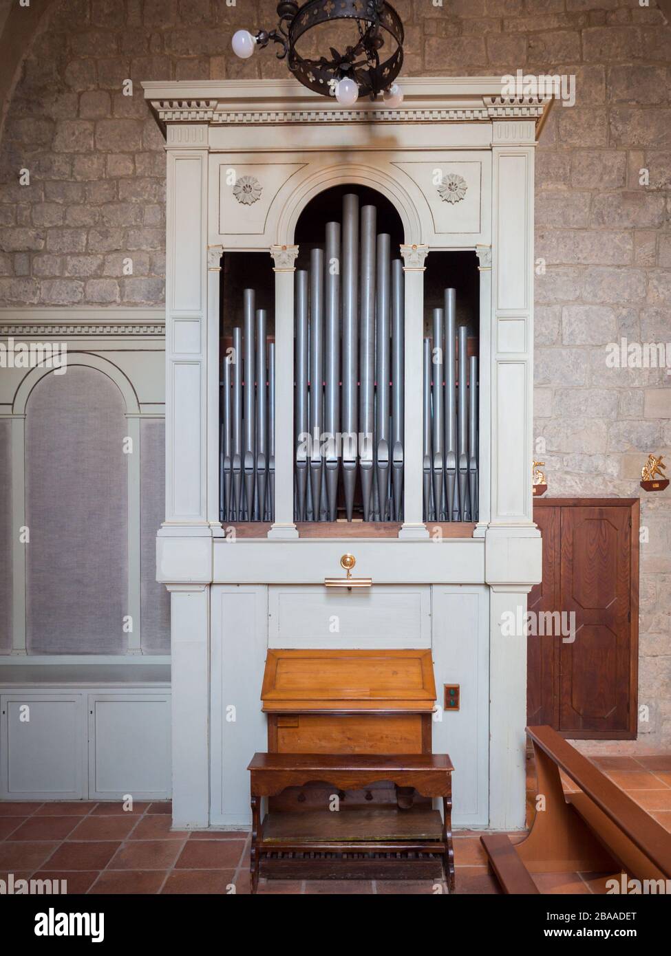 Wooden white organ in an Italian church. Stock Photo
