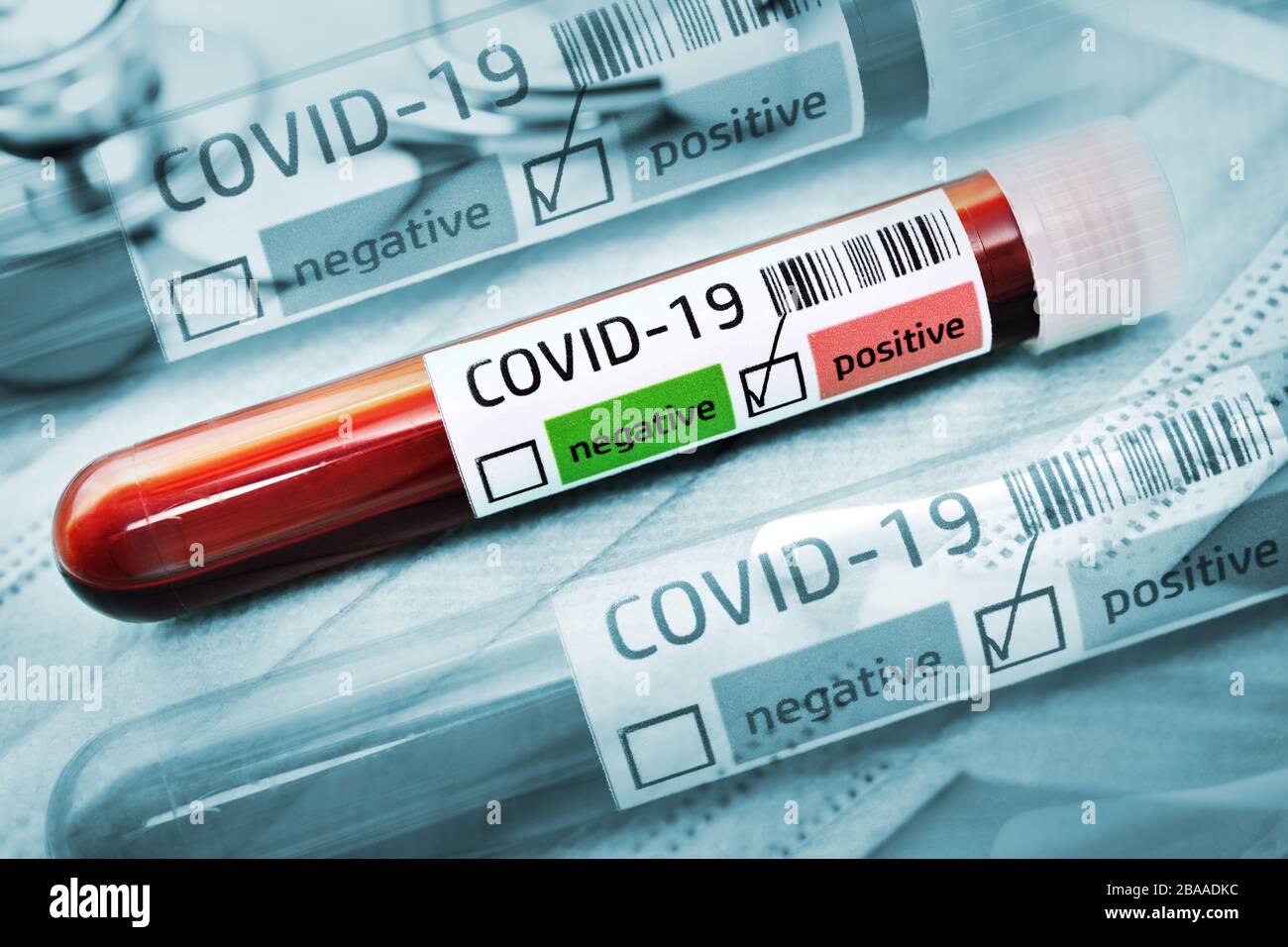 PHOTOMONTAGE, blood tests with positive Covid 19 findings, symbolic photo Coronavirus, FOTOMONTAGE, Blutproben mit positivem Covid-19-Befund, Symbolfo Stock Photo