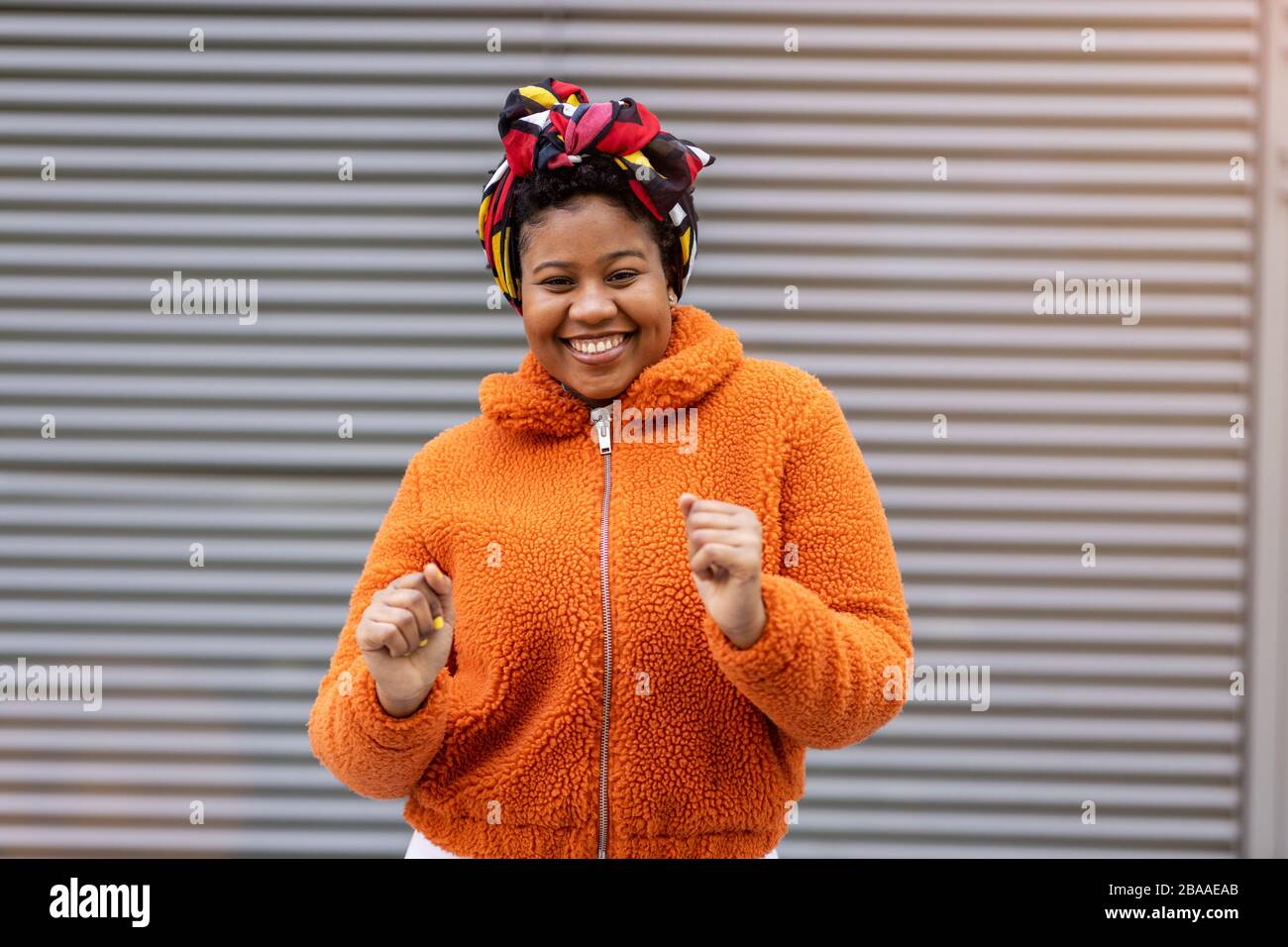Woman afro hair laughing hi-res stock photography and images - Alamy