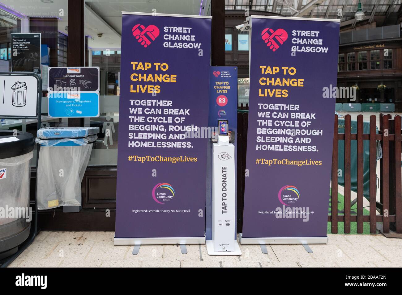 'Street Change Glasgow' point at Central Station - GoodBox payment device - a way to donate to people experiencing homelessness across Glasgow Stock Photo
