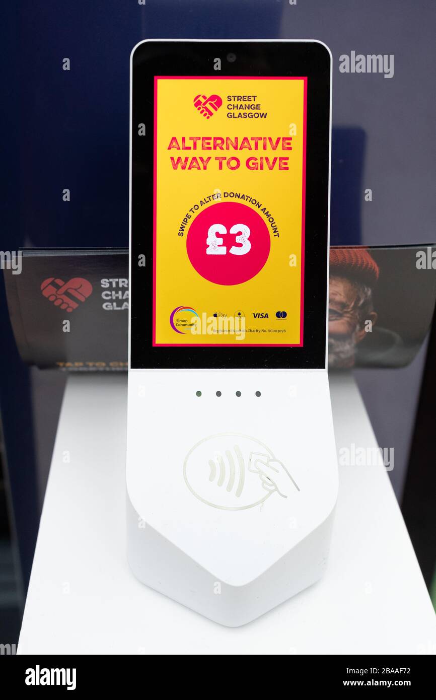 'Street Change Glasgow' point at Central Station - GoodBox payment device - a way to donate to people experiencing homelessness across Glasgow Stock Photo