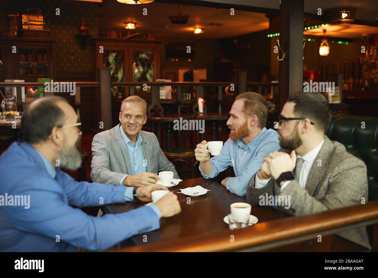 Group of businessmen suits hi-res stock photography and images - Alamy