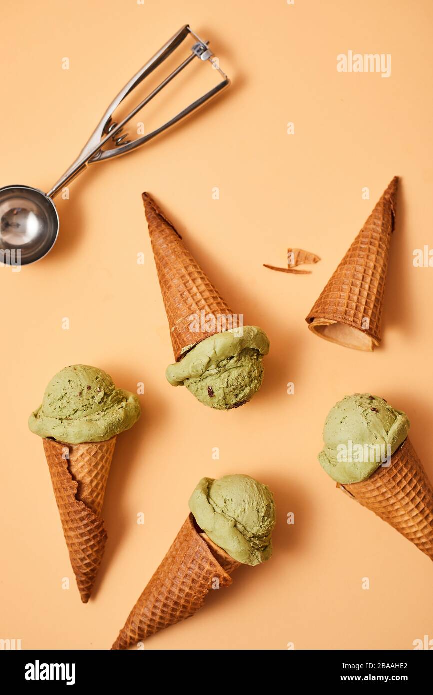 Green tea ice cream on pastel background Stock Photo Alamy