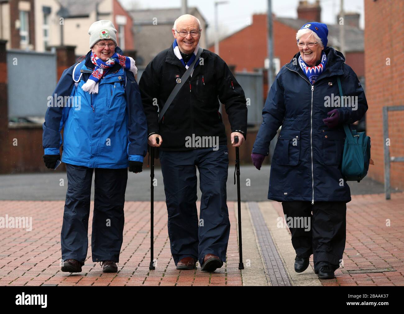 Blackburn Rovers fans arrive ahead of the Sky Bet Championship match at Ewood Park Stock Photo