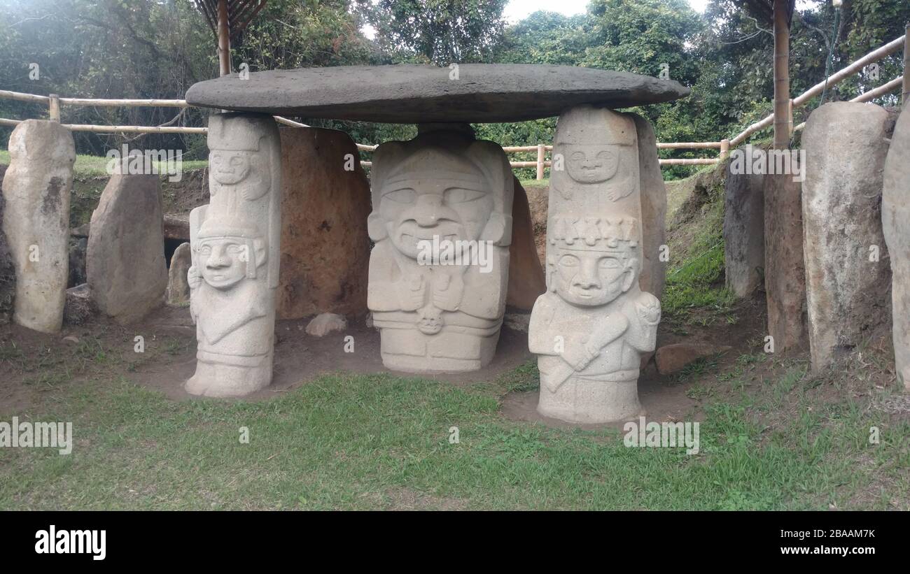 Statues in The San Agustín Archaeological Park surrounded by greenery ...