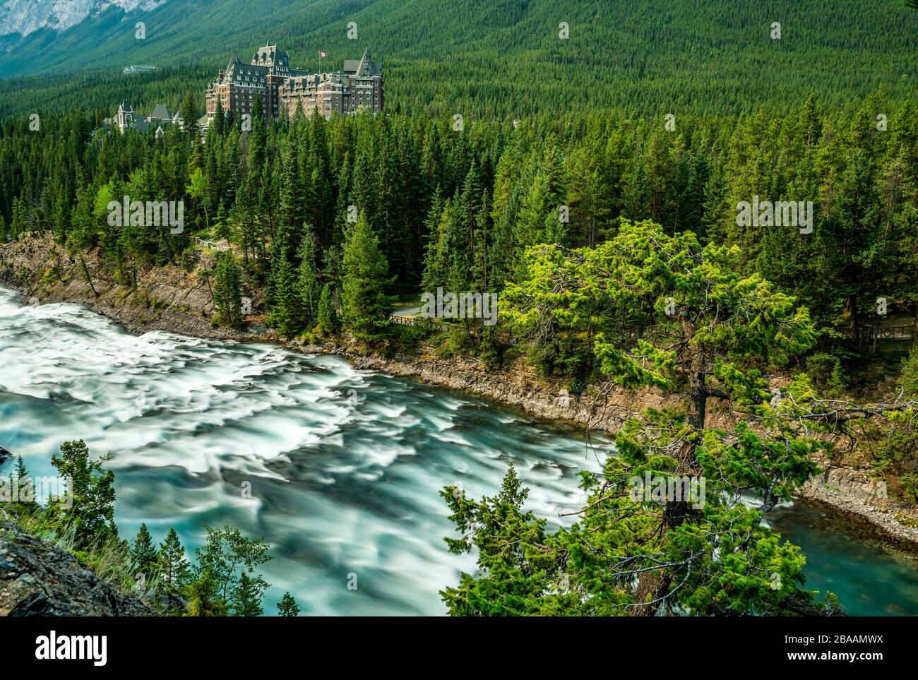 Banff Springs Hotel with Bow River in foreground, Banff, Alberta ...