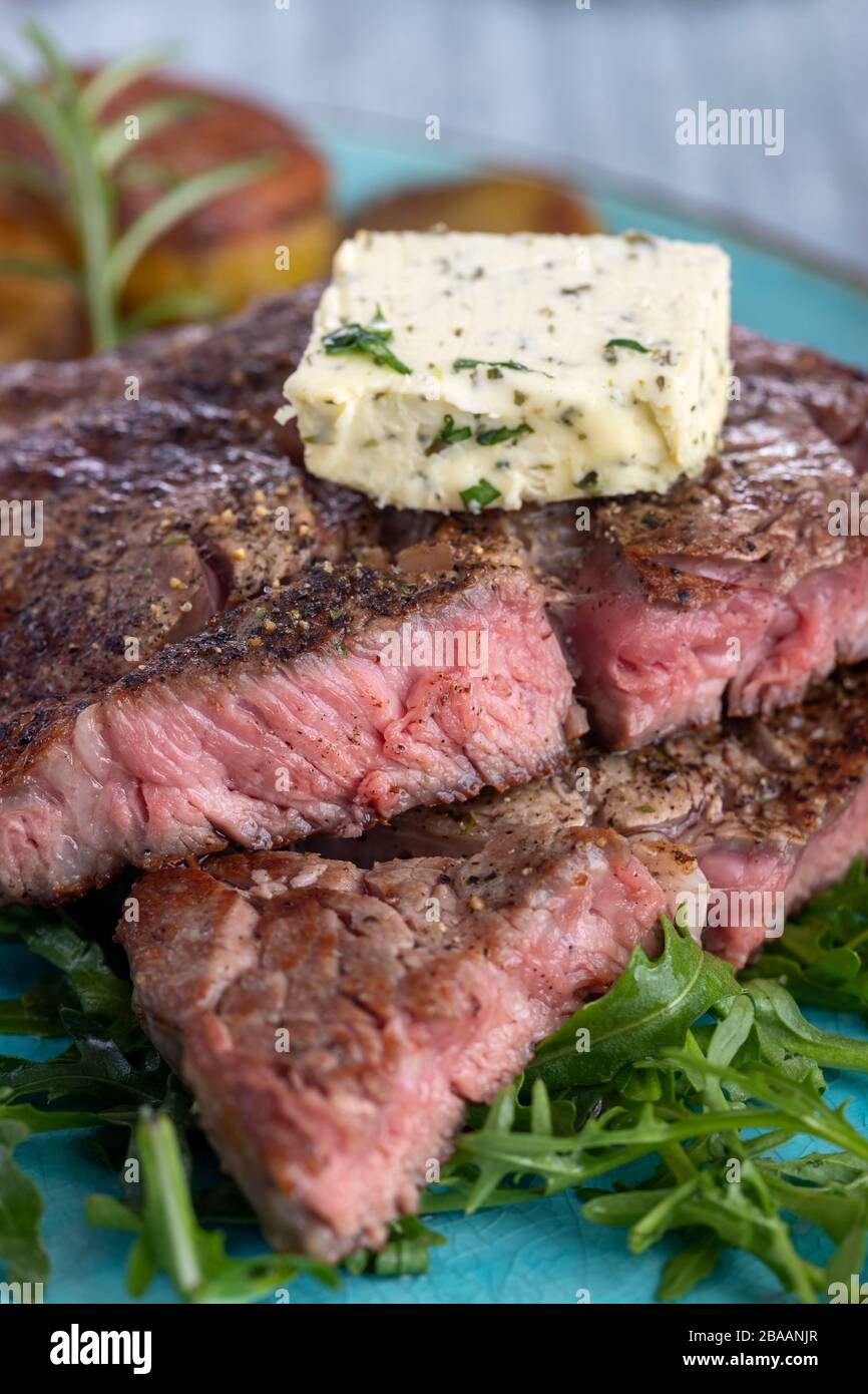 Juicy grilled steak on a plate hires stock photography and images Alamy
