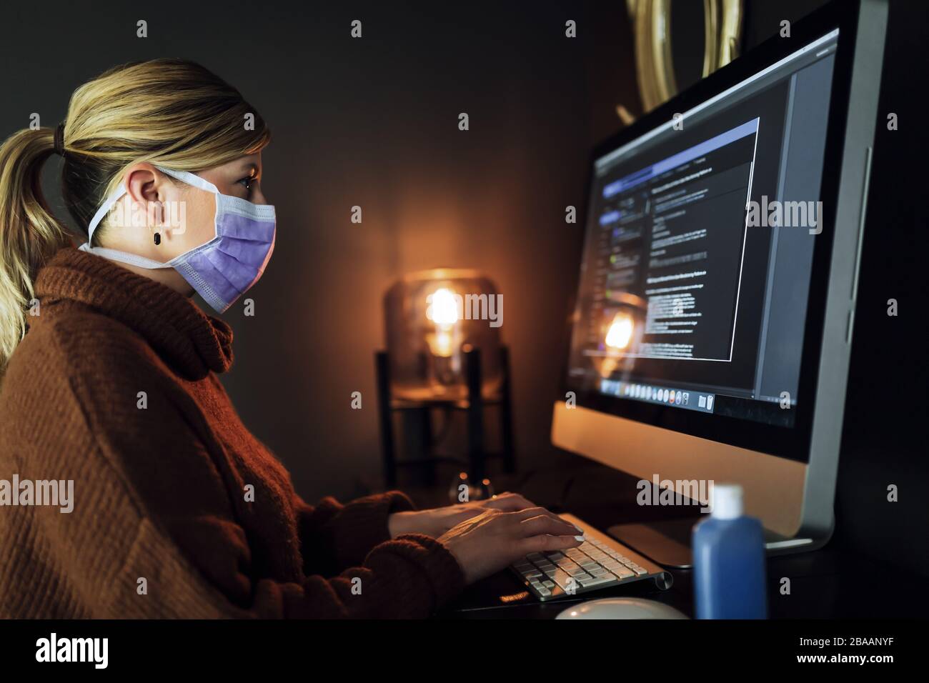 Woman working at home because of Corona virus Covid-19 quarantine Stock Photo