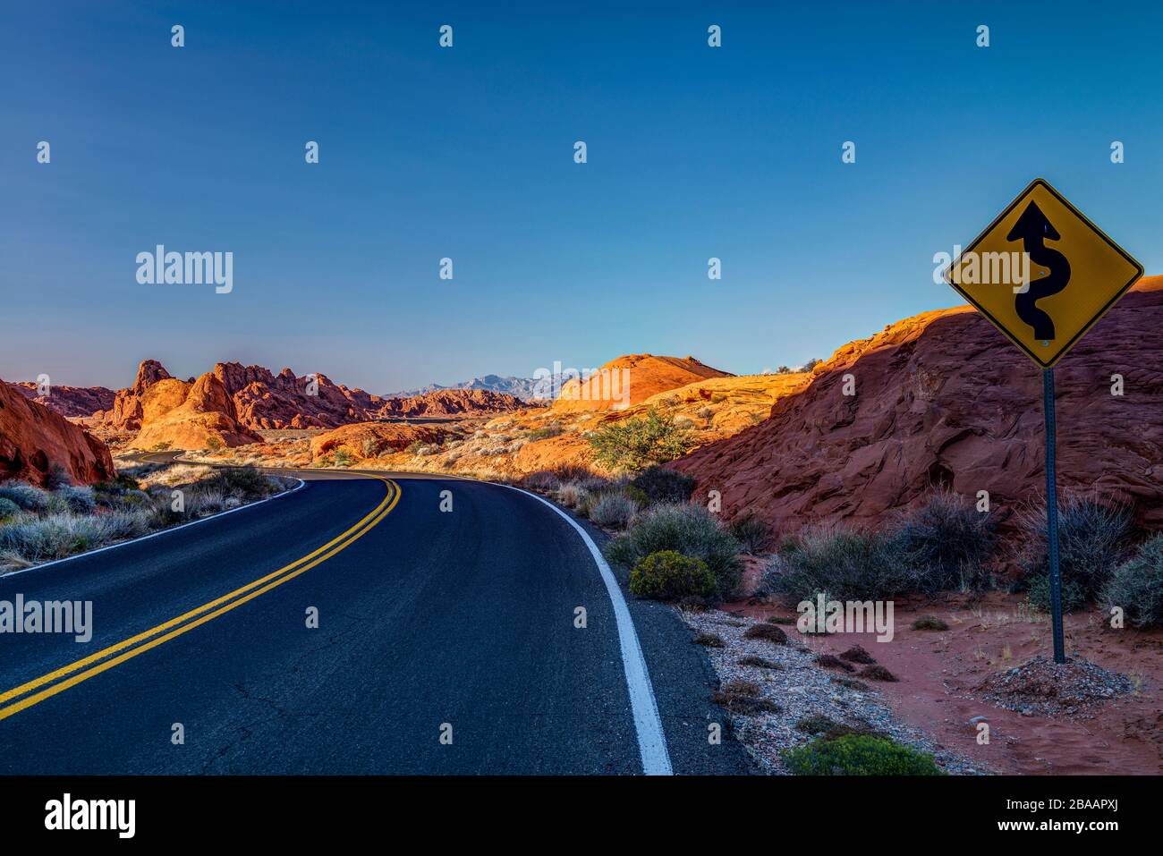 Road through Red Rock of Valley of Fire State Park, Nevada, USA Stock Photo
