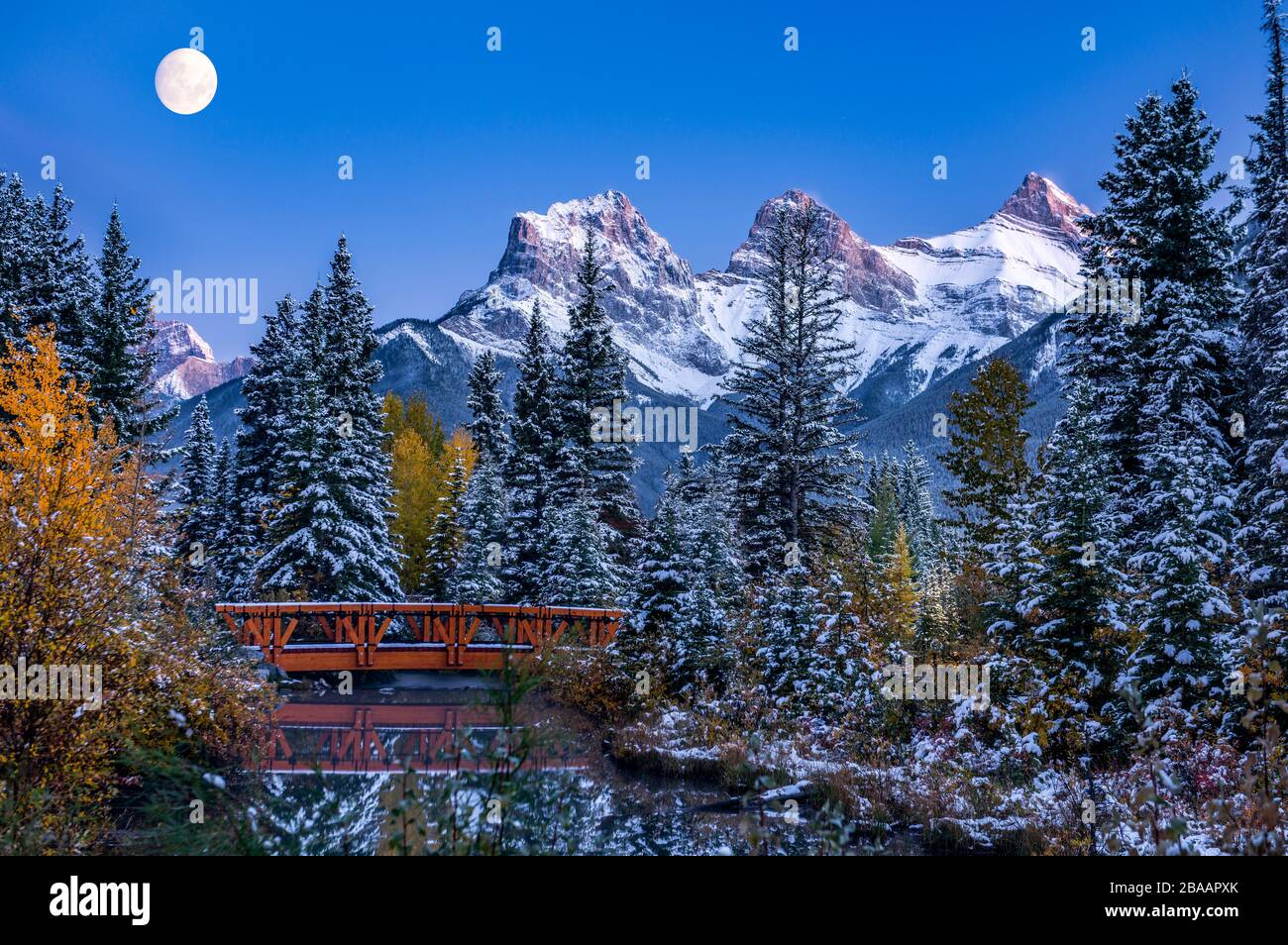 View of Spring Creek Bridge at Three Sisters Mountain, Canmore, Alberta, Canada Stock Photo