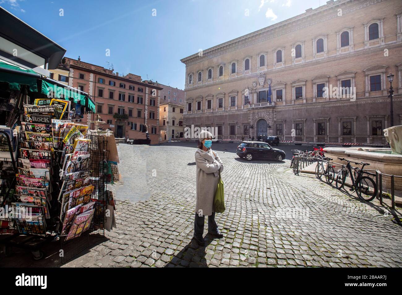 Rome March 25th 2020 Rome during the Coronavirus pandemic. people wear mask in Piazza Farnese  Photo by Elio Castoria Stock Photo
