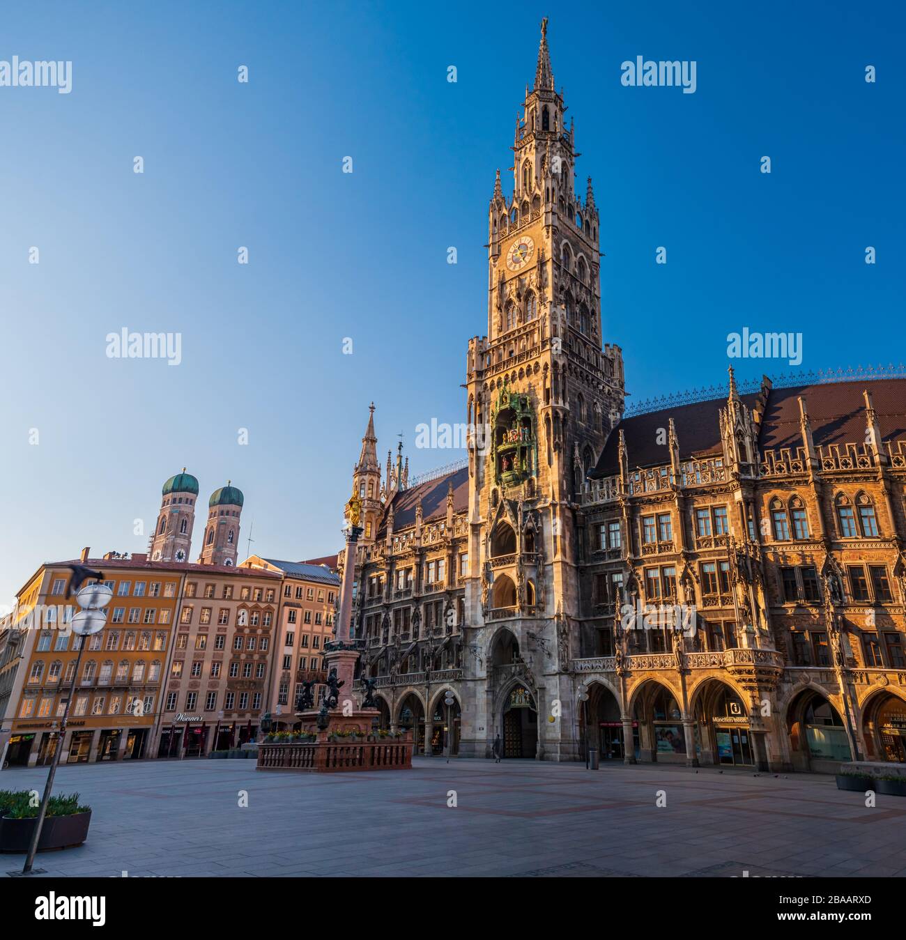 Munich-Germany, March 25 2020: Almost no people on the usually crowded Marienplatz square in Munich due to the Corona crisis Stock Photo