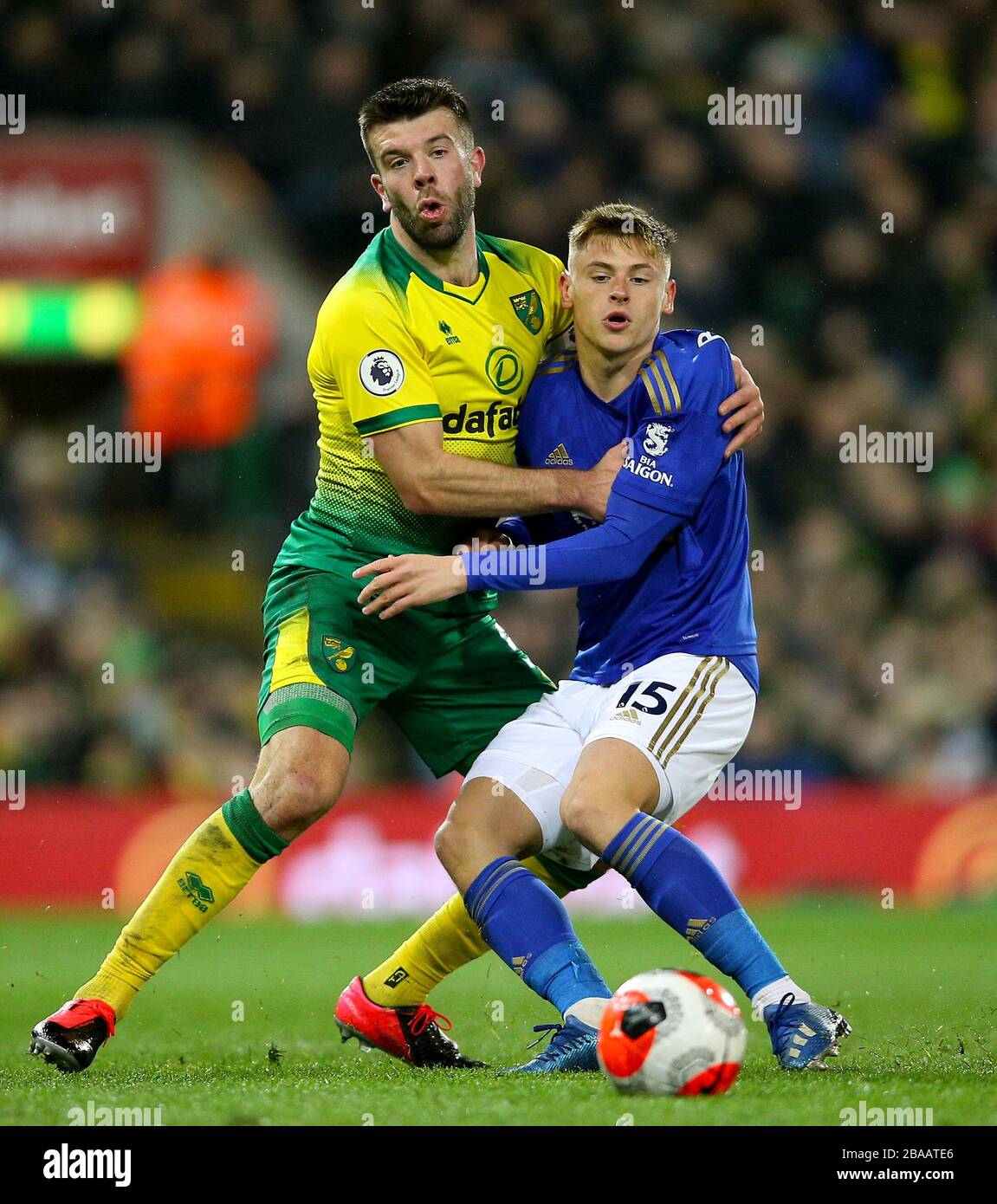 Norwich City's Grant Hanley (left) and Leicester City's Harvey Barnes battle for the ball Stock Photo