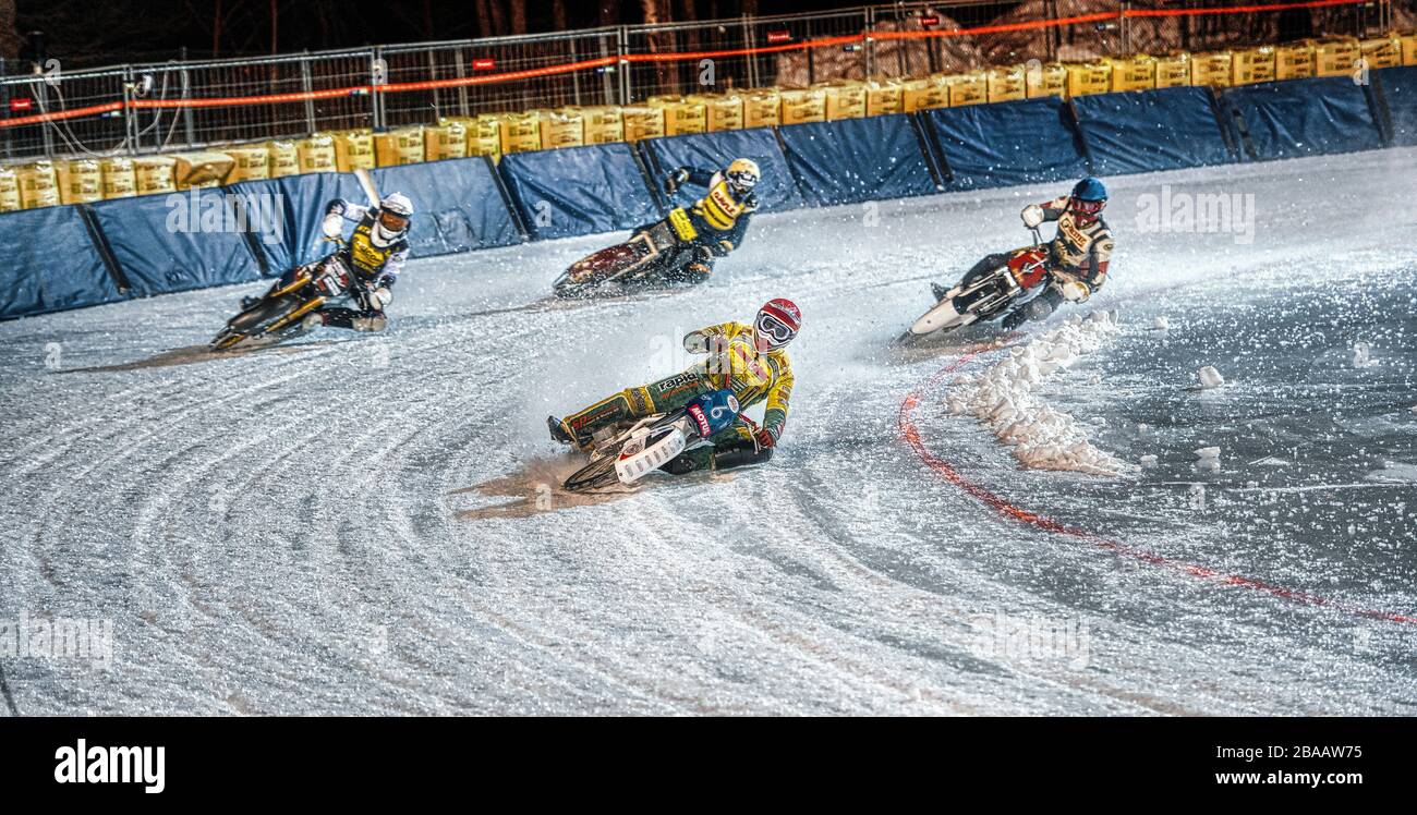 Four ice racing riders in full speed in Sweden Stock Photo