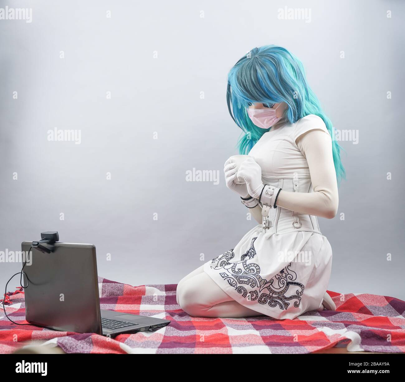 Coronavirus. Anime young woman at home sick with mask for corona virus.  Female wears masks to protect and take care of health. Home working with  compu Stock Photo - Alamy, image size:1300x1227