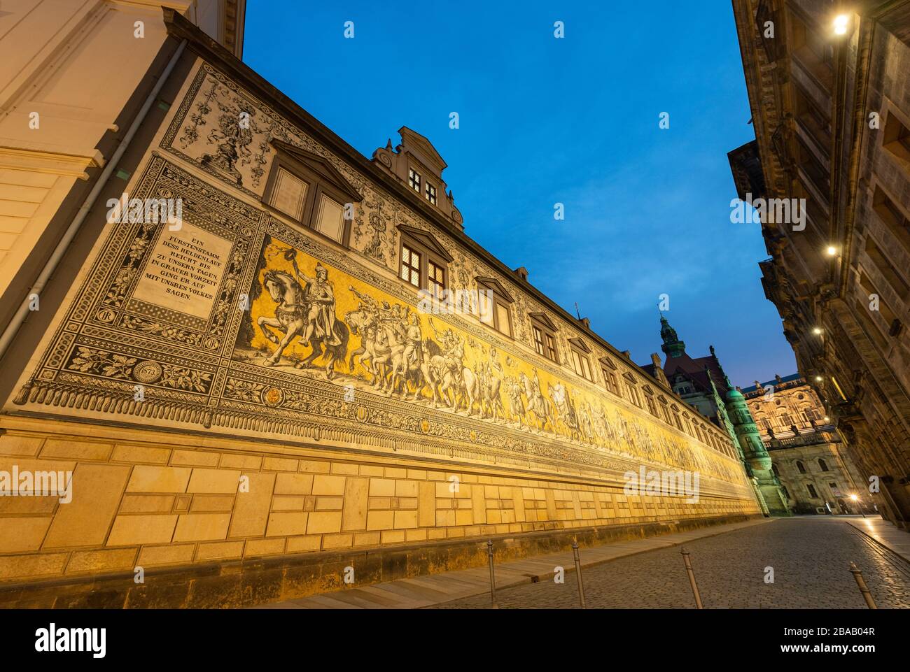 Dresden, Germany. 26th Mar, 2020. The Fürstenzug in the evening is deserted. To contain the coronavirus, Saxony now bans all gatherings of three or more people in public. Credit: Robert Michael/dpa-Zentralbild/dpa/Alamy Live News Stock Photo