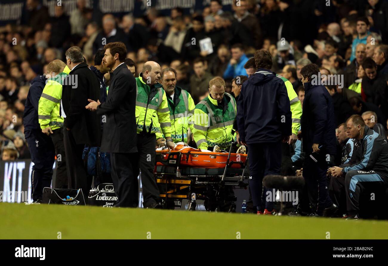Tottenham Hotspur's Sandro is taken off on a stretcher Stock Photo
