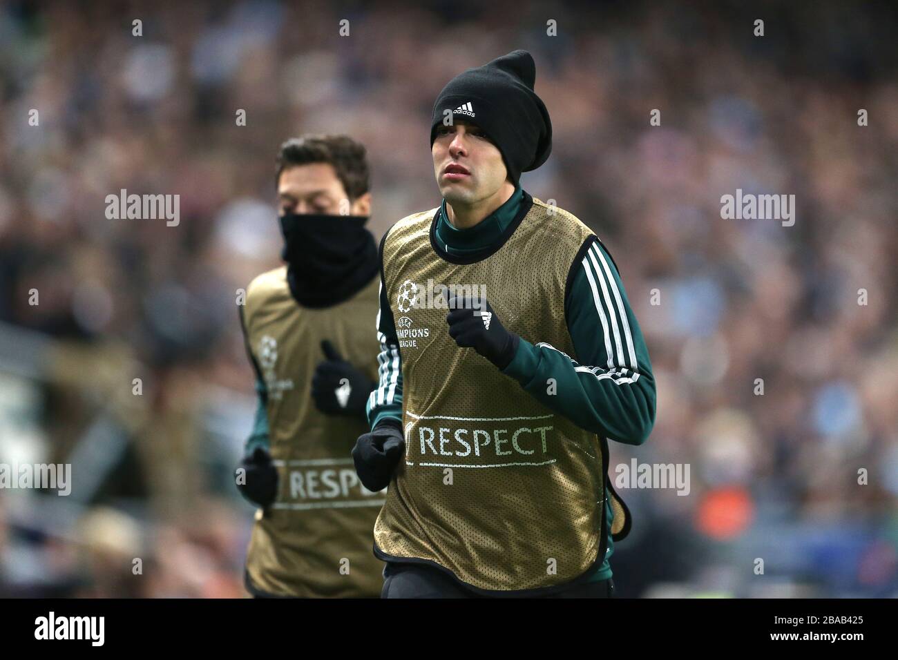 Real Madrid's Kaka warms up with teammate Mesut Ozil Stock Photo