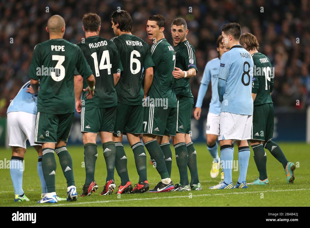L-R: Real Madrid's Pepe, Xabi Alonso, Sami Khedira, Cristiano Ronaldo and Karim Benzema form a defensive wall that Manchester City's Samir Nasri tries to infiltrate Stock Photo
