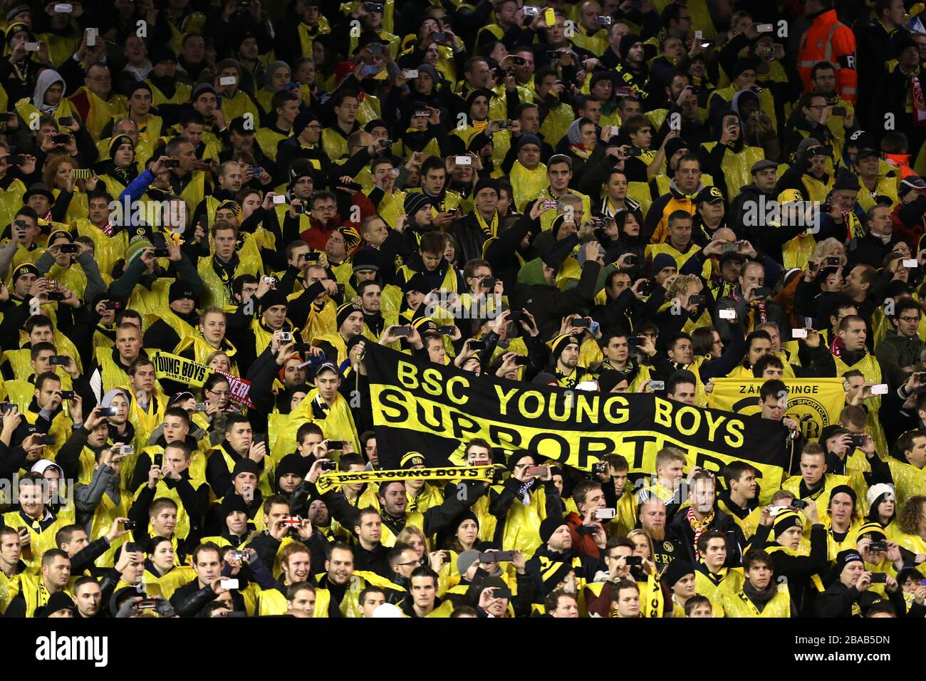 Young Boys fans in the stands at Anfield Stock Photo Alamy