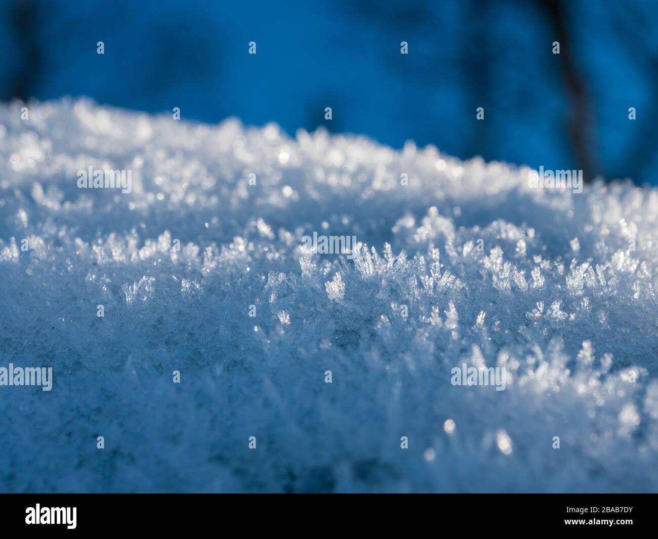 Ice Crystals On Snow With Blue Background Stock Photo Alamy Ice Crystals On Snow With Blue Background Stock Photo Alamy