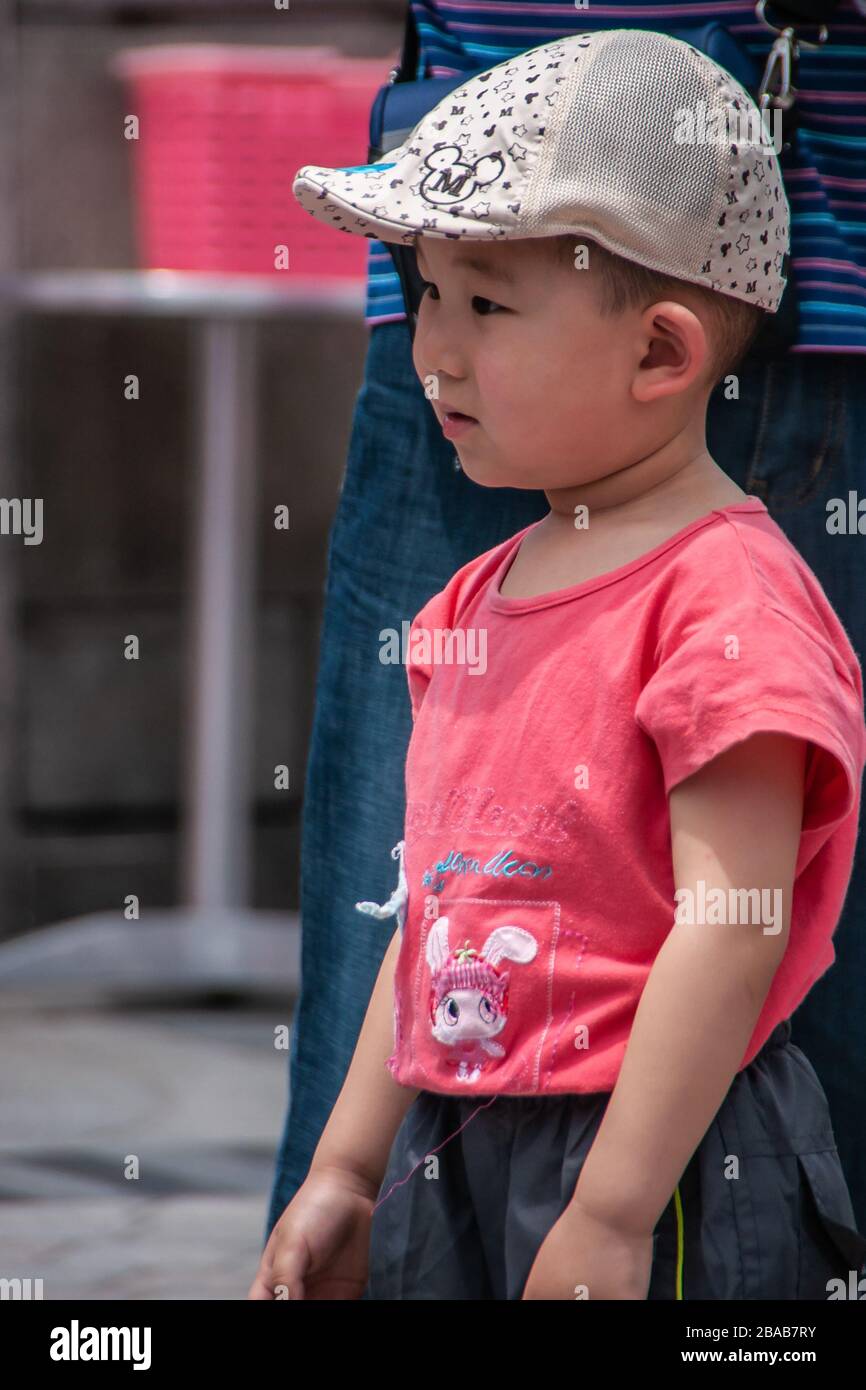 Boy wearing baseball cap hi-res stock photography and images - Alamy