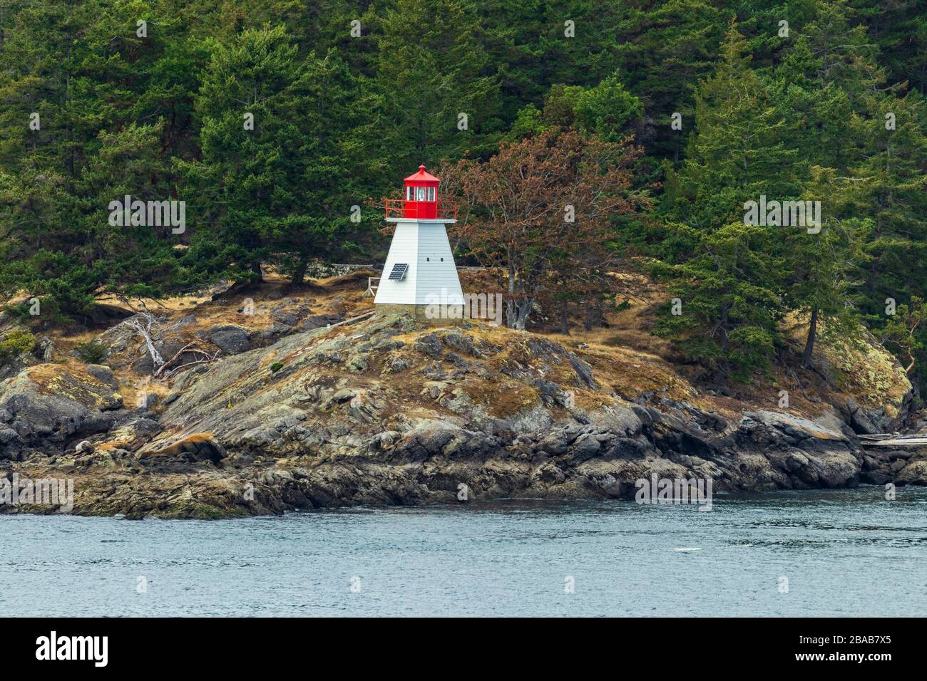 Portlock Point Lighthouse on Prevost Island in Gulf Islands, at Port Washington, BC, Canada. Stock Photo