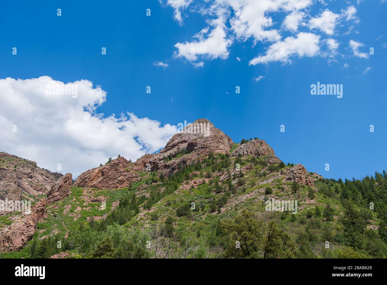 Low angle landscape of jagged mountains on the Shelf Road near Cripple Creek, Colorado Stock Photo