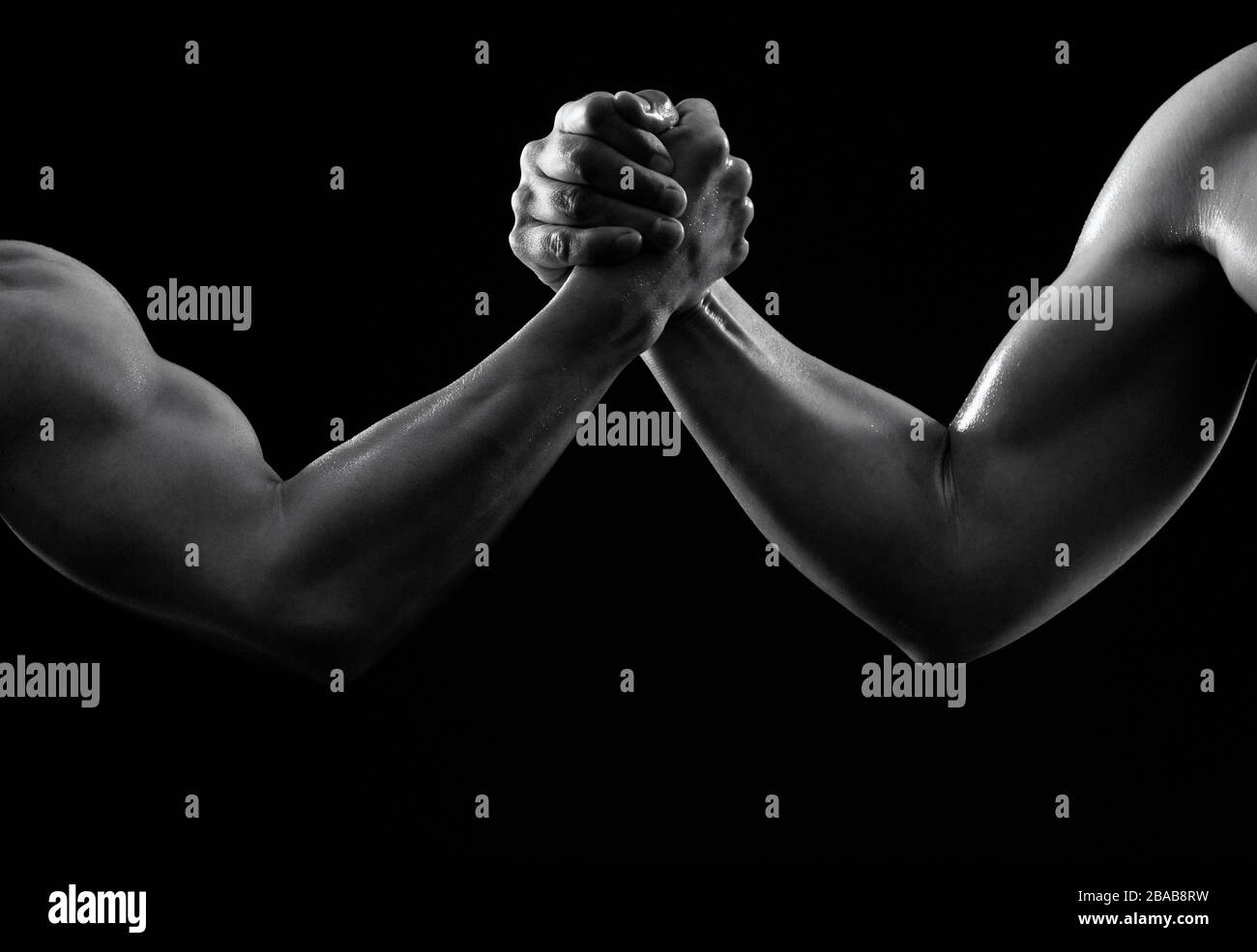 Black and white photo of arm wresting Stock Photo