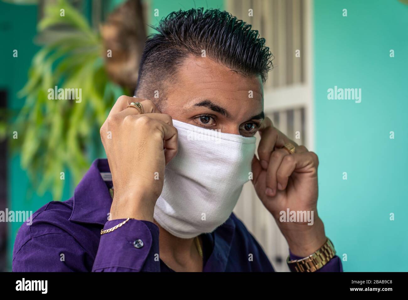 A young man wearing face mask protection Stock Photo Alamy