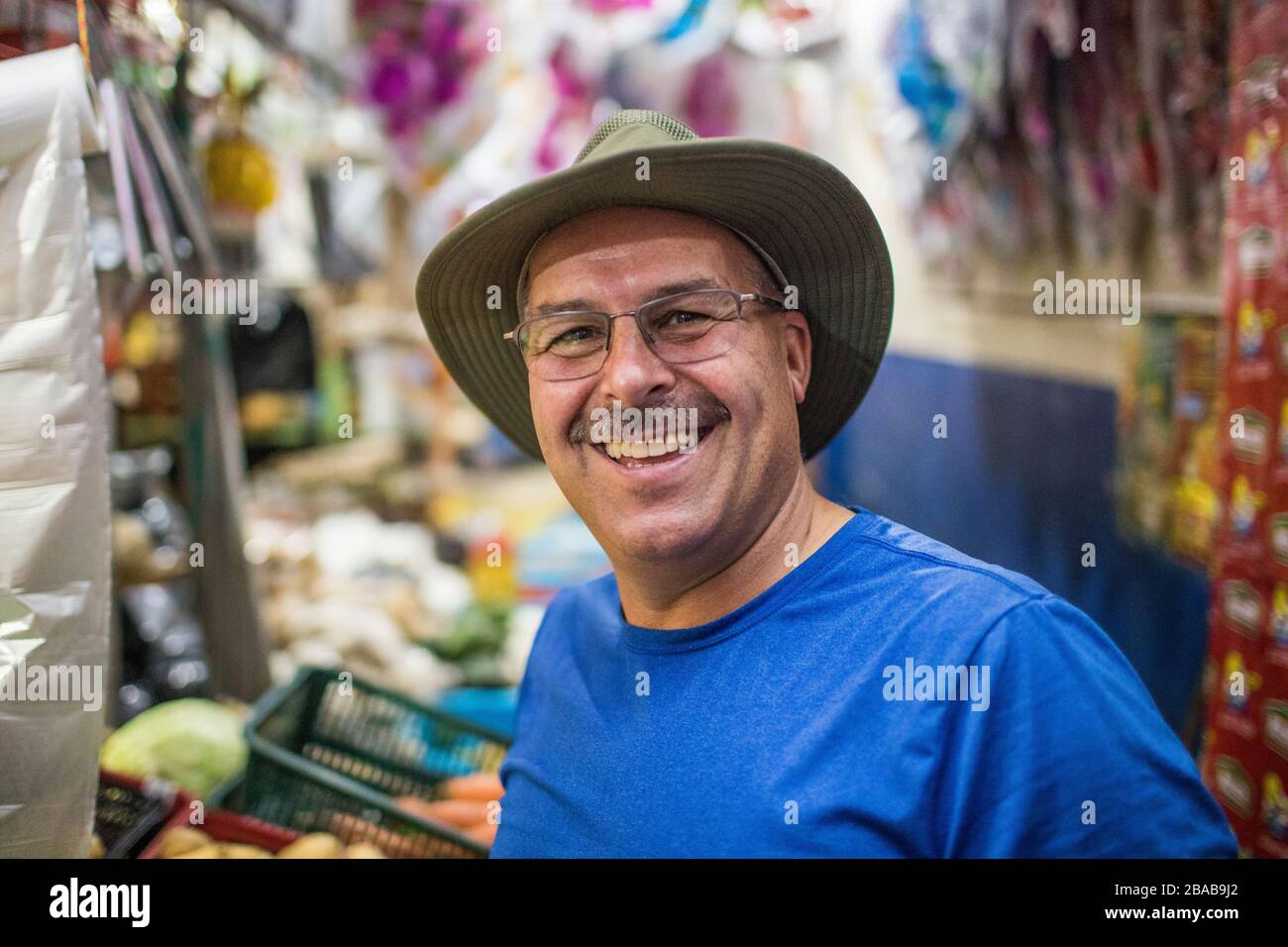 Portrait of elderly tourist in local Guatemalan market. Stock Photo