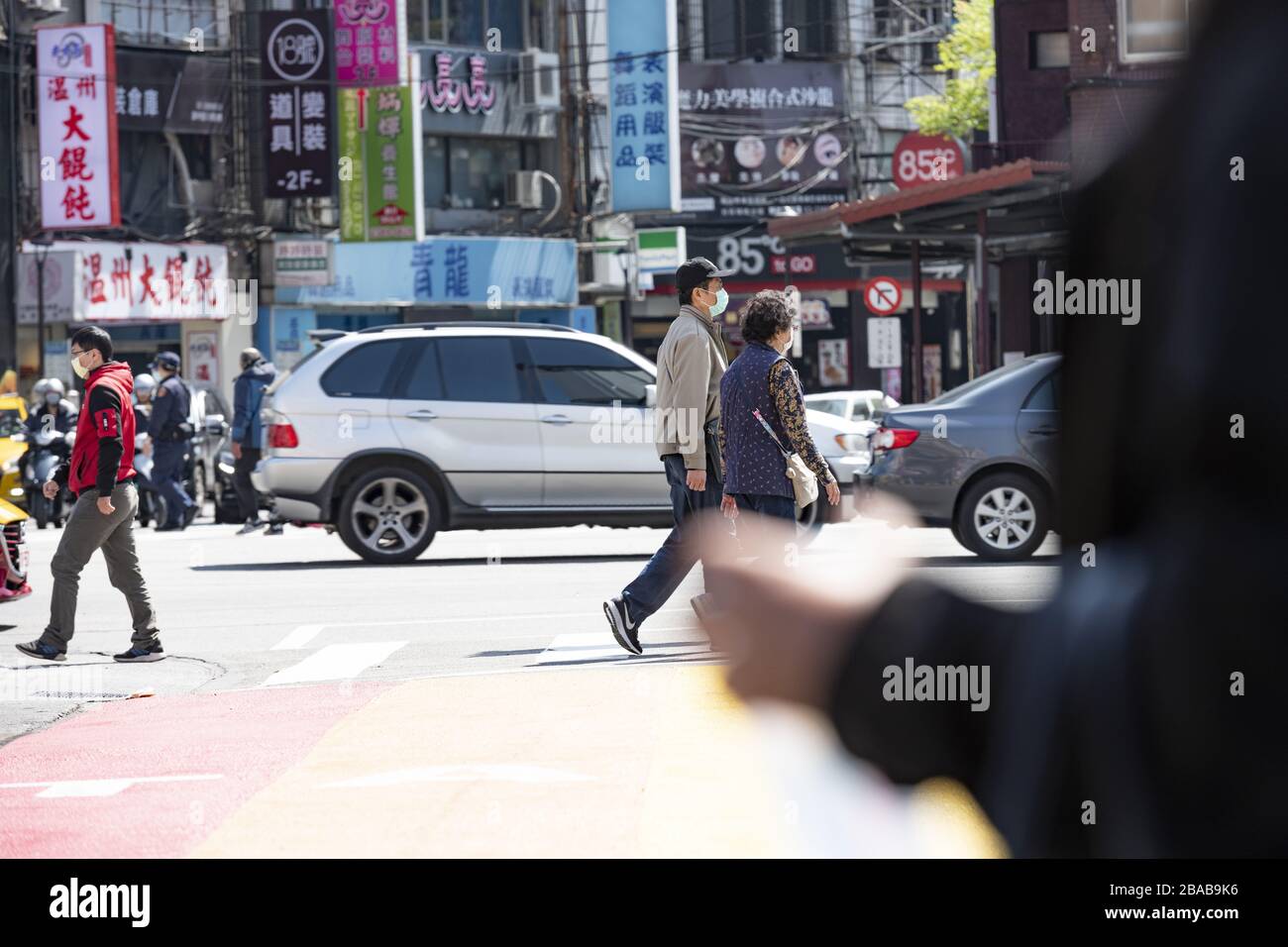 Some people wearing a face mask