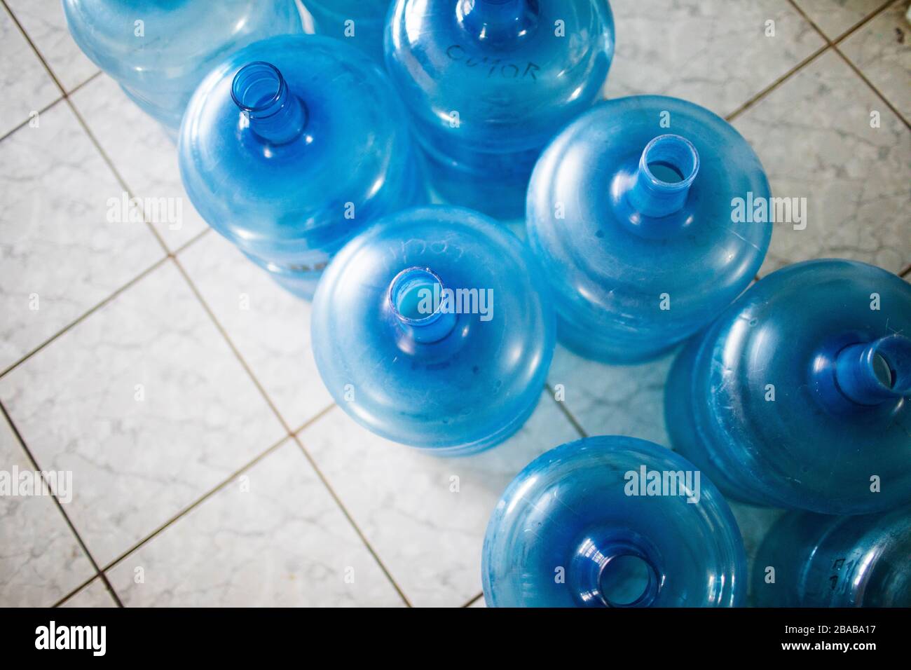Clean drinking water jugs ready to be filled Stock Photo Alamy