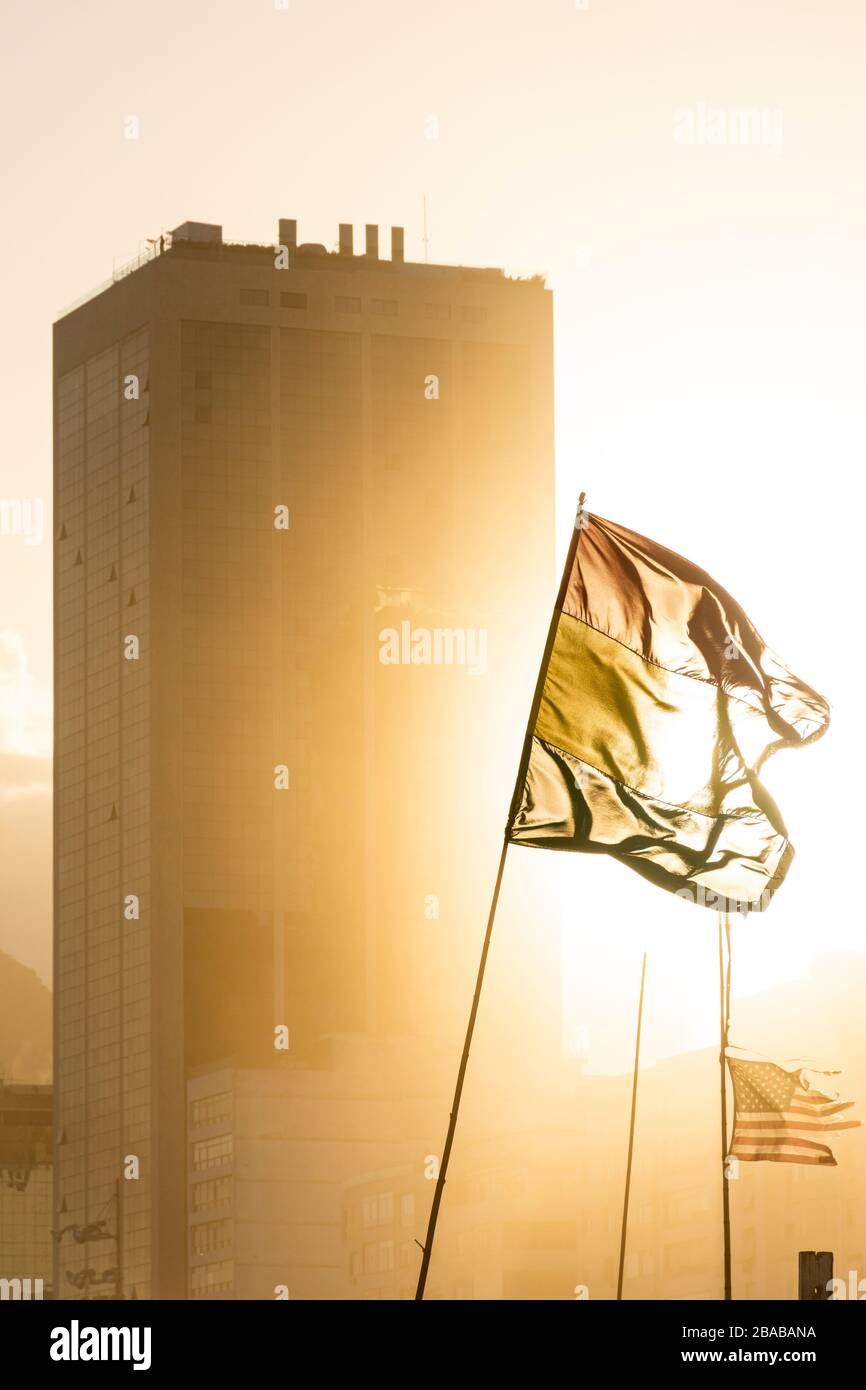 Beautiful view to flags and building during sunset in Copacabana Beach Stock Photo