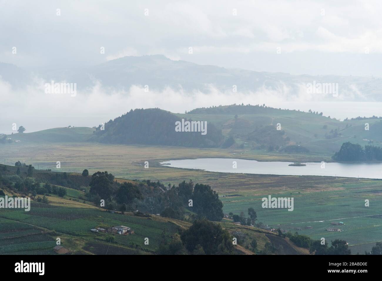 Misty Andean landscape: Tota, the largest lake in Colombia, a cold and cloudy day, before the rain Stock Photo
