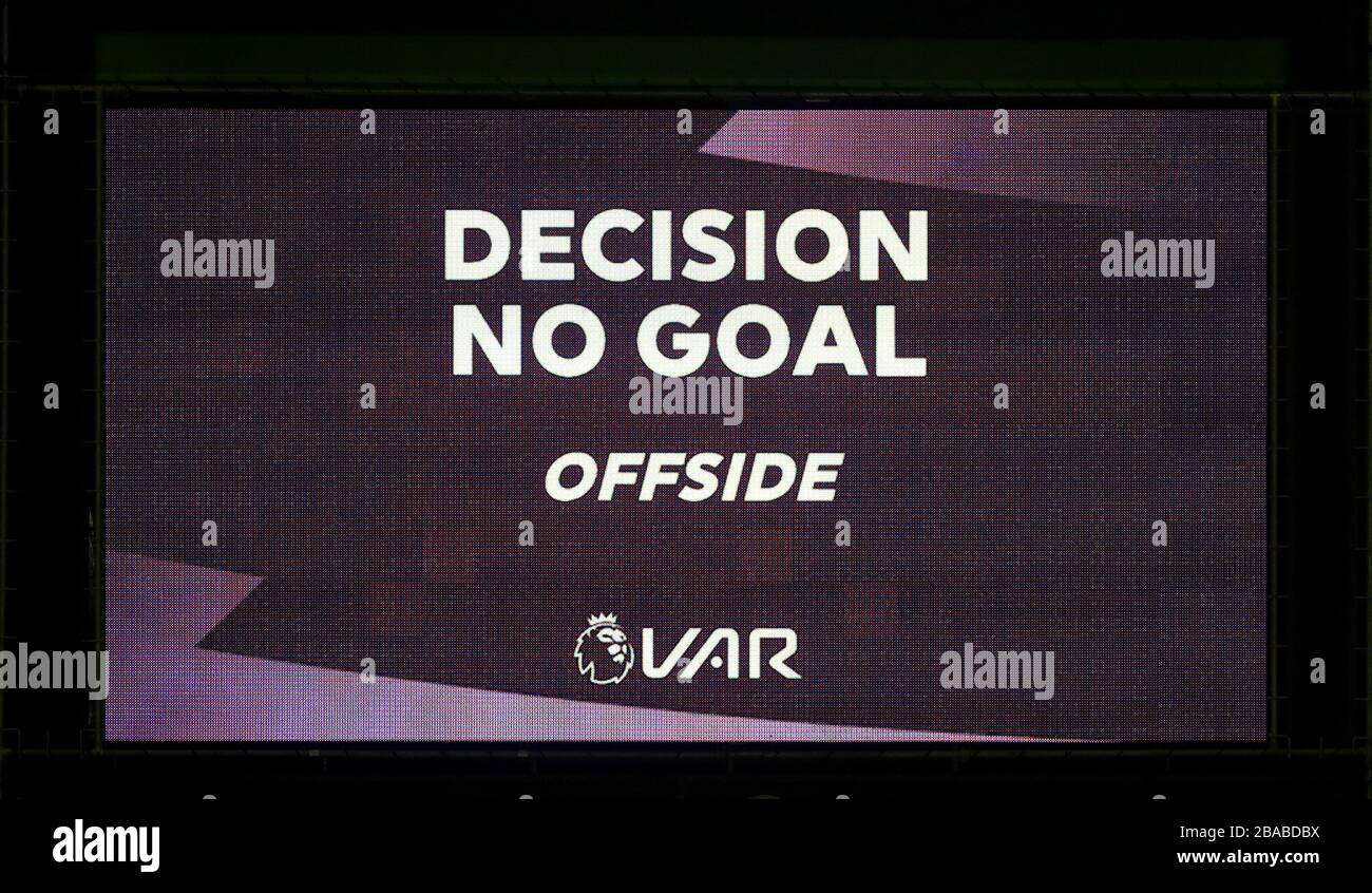 The big screen shows that the VAR decides Wolverhampton Wanderers' Willy Boly's goal is disallowed because of an offside by his team-mate Diogo Jota Stock Photo