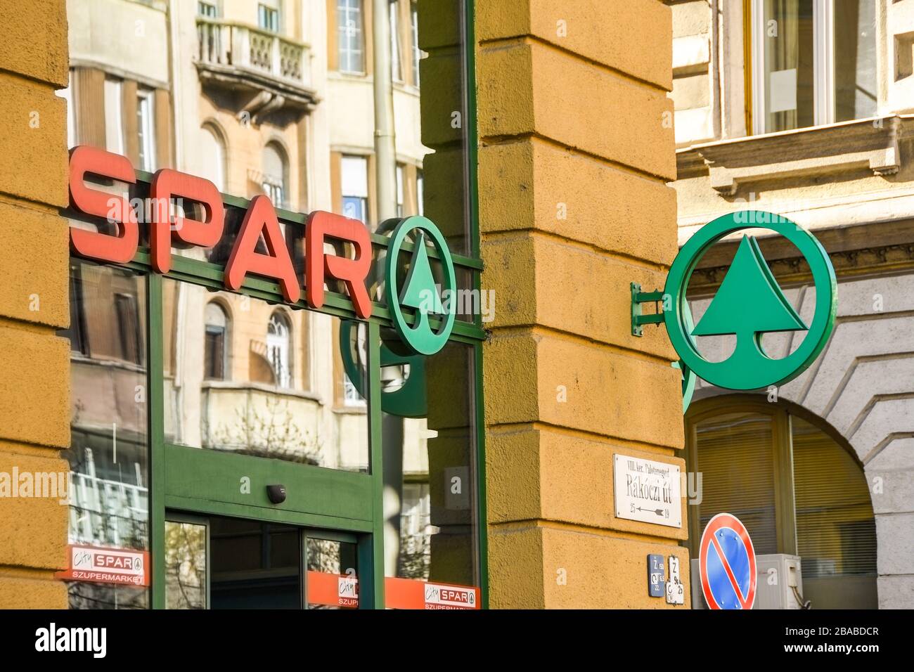 BUDAPEST, HUNGARY - MARCH 2019: Signs on the outside of a Spar supermarket in Budapest city centre. Stock Photo