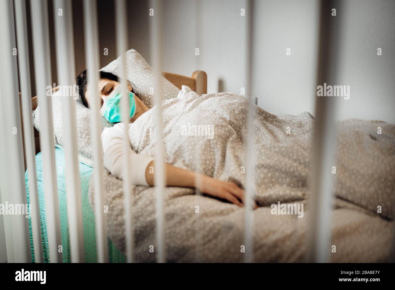 Infected woman with mask in mobile quarantine hospital units isolation.Coronavirus patient having pneumonia disease symptoms.Health care.Immunity Stock Photo