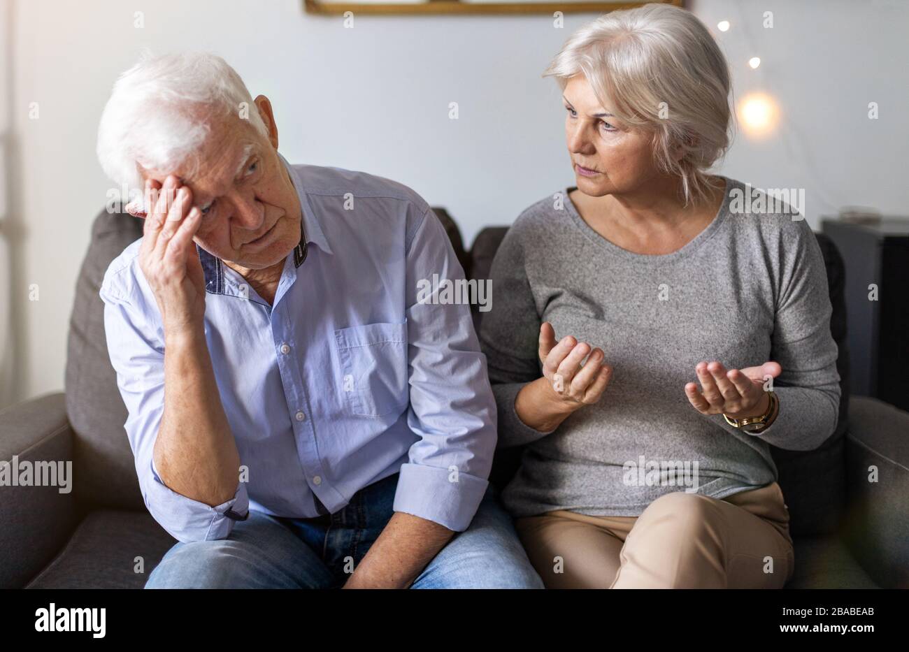 Senior couple having an argument at home Stock Photo