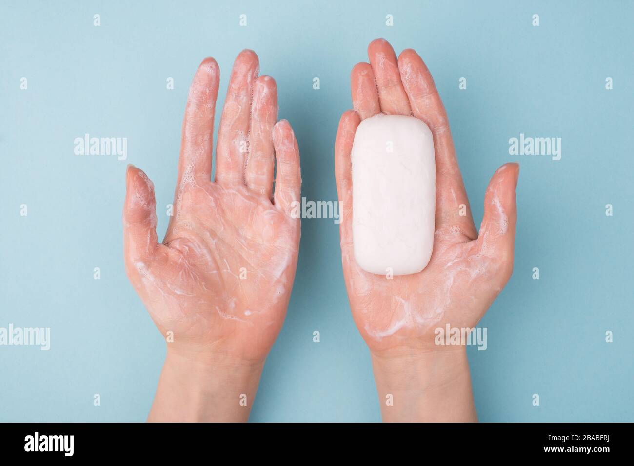 Above top overhead closeup view photo of hands using holding bar of