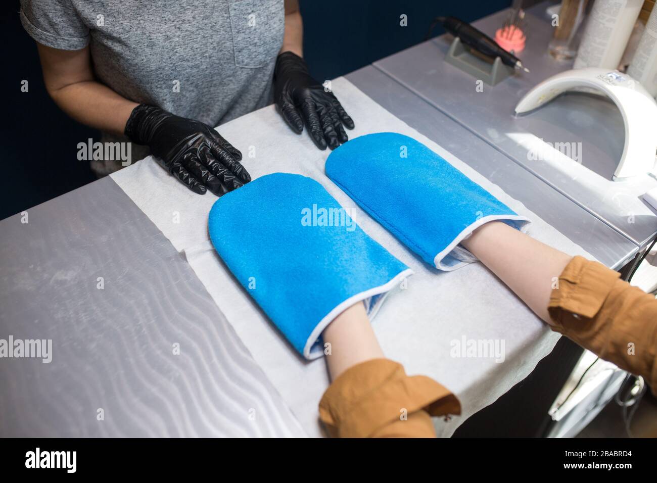 Spa Salon. Manicure. Paraffin Hand Bath. process paraffin treatment